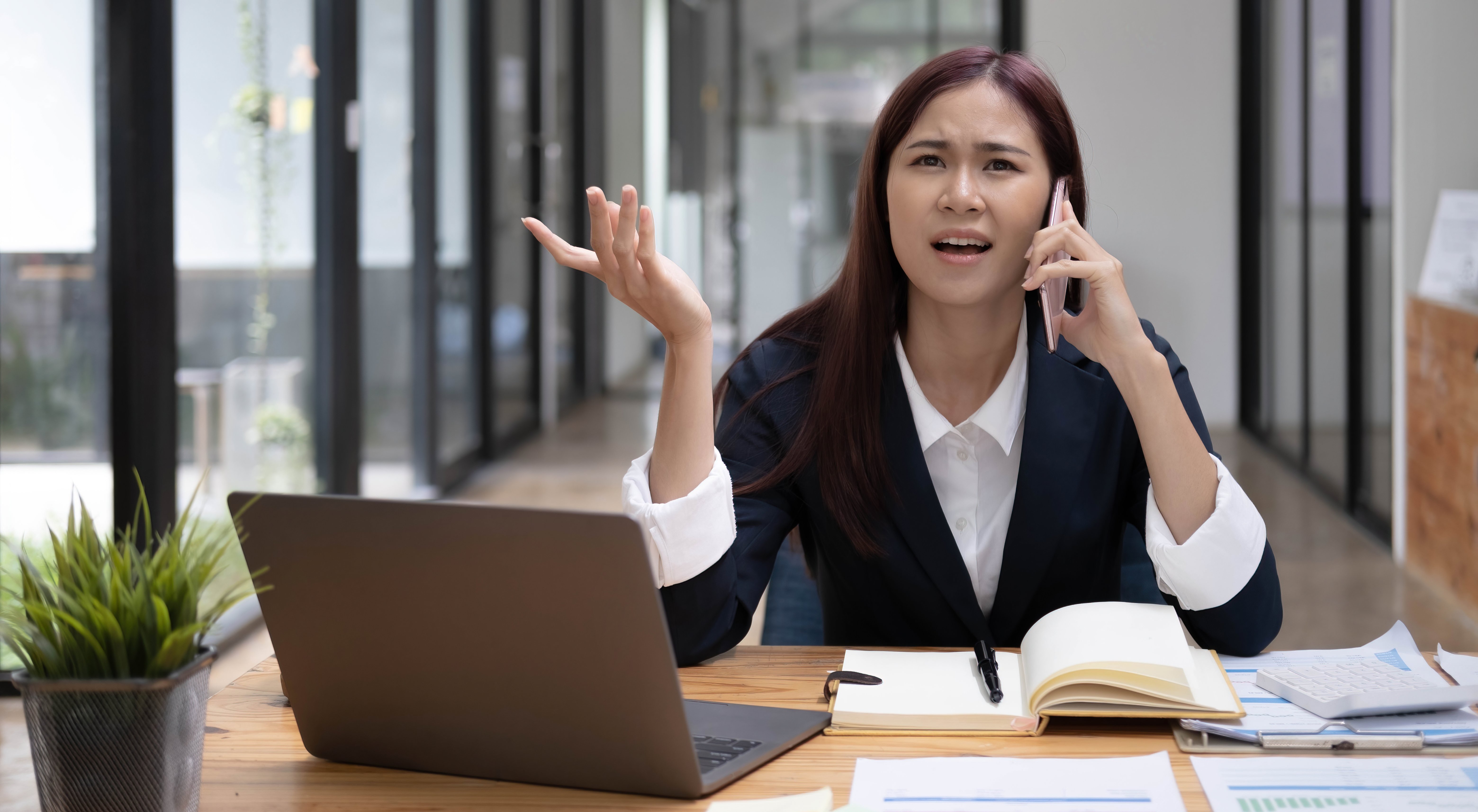 vecteezy_stressed-asian-businesswoman-or-female-marketing-manager_10141206